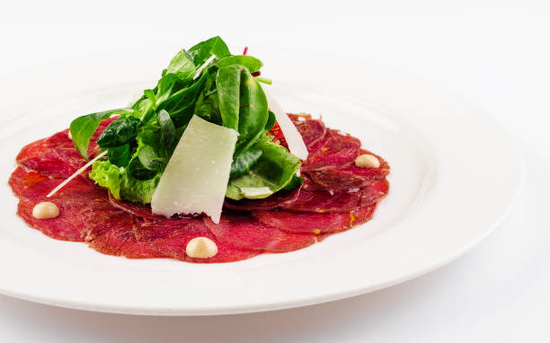 istock Beef carpaccio with parmesan cheese close up 2037186127