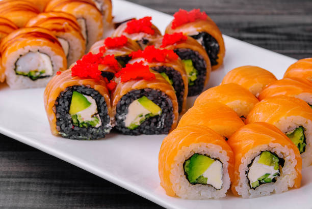 istock varios Philadelphia sushi rolls with salmon on a plate 2037188250