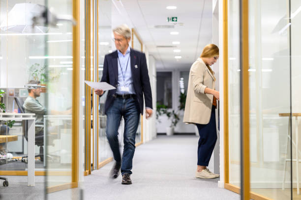 istock Businessman walking in office 2037212286