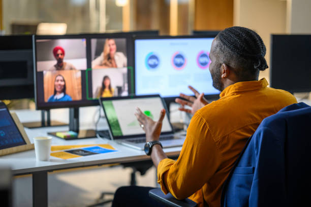 Businessman with colleagues during conference call