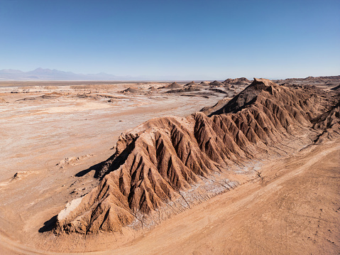 drone view over salt rock formations in the Atacama desert, callled cordillera de la sal