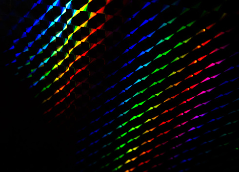 Abstract on conceptual RGB light effect in shiny paper texture background. Idea for wallpaper, card, post online,web title or more use.