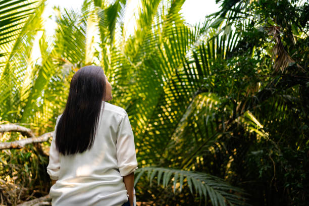 Dreamy Woman Enjoying Peaceful Forest Ambiance