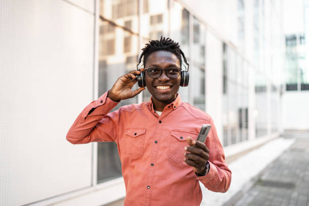 istock Cheerful young man enjoying in music 2037262811