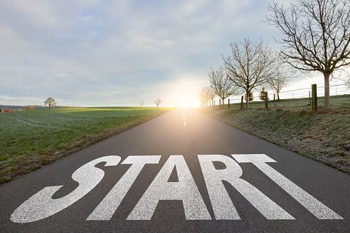 Concept of start straight and beginning for cooperation or business goals. Start text on the highway road concept for planning and challenge or career path, business strategy, opportunity and change.