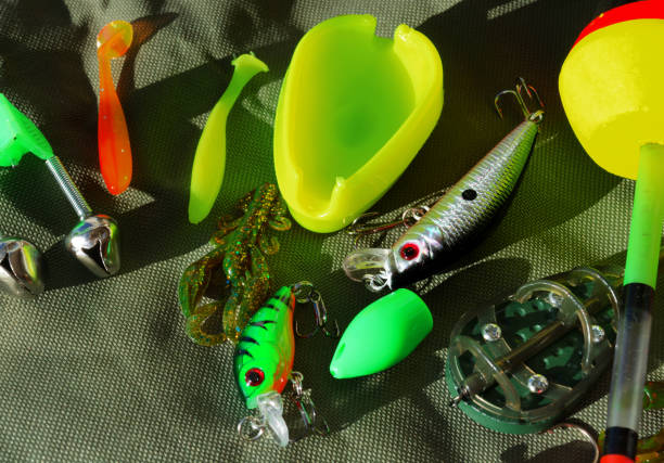 Fishing gear on a tarpaulin background. Background for a fishing theme.