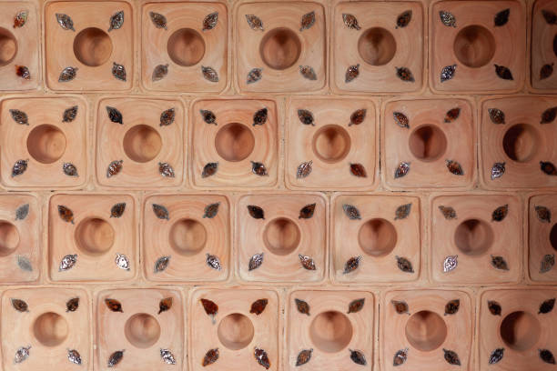 Old vintage clay tiles for decoration stoves and fireplaces. Background, texture