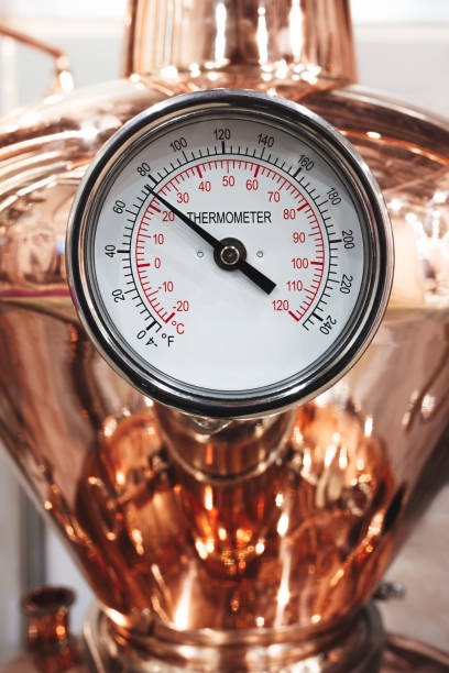 istock thermometer close-up on a copper tank distiller 2037345734