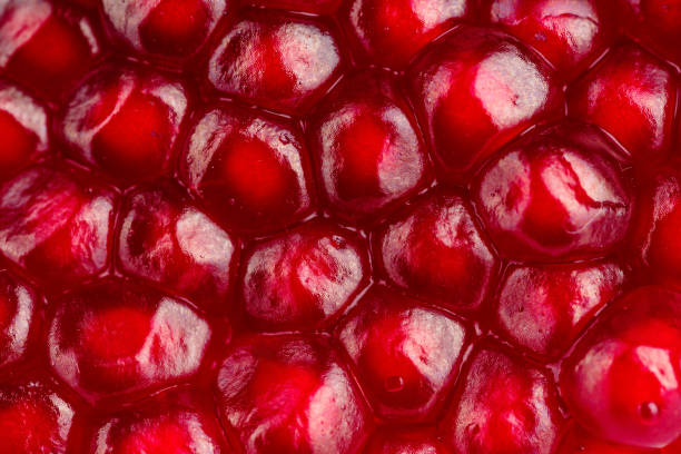 istock Pomegranate seeds close up. Pomegranate seed texture. 2037449071