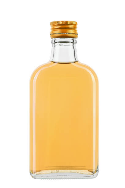 istock Glass bottle with liquid on a white background. File contains clipping path. 2037450660