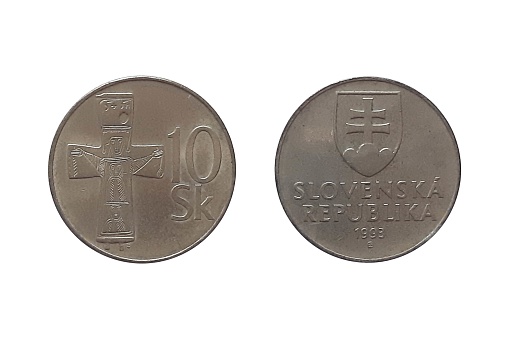 10 Korún 1993 year on white background. Coin of Slovakia. Obverse Slovak shield, the date below, and the mintmark and designer's initials at the bottom. Reverse Bronze cross (11th century A.D.) and value to the right