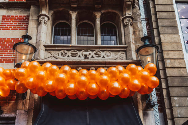 Background of orange color balloons for celebration event