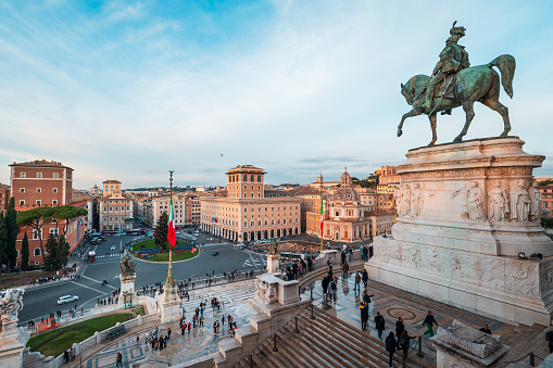 Rome, Italy - December 22, 2022: The commanding Monument to Victor Emmanuel II overlooking Piazza Venezia with a clear blue sky backdrop