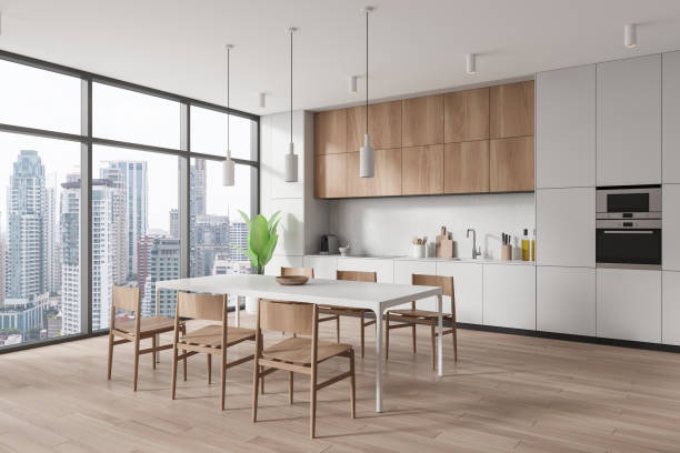 istock Stylish home kitchen interior with eating and cooking zone, panoramic window 2037568519