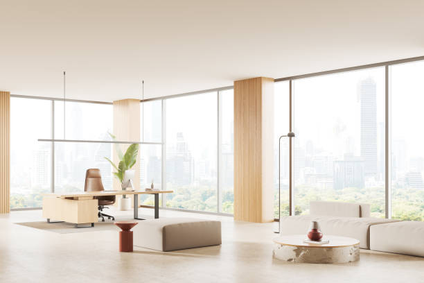 istock Elegant office interior with ceo desk and chill corner near panoramic window 2037571159
