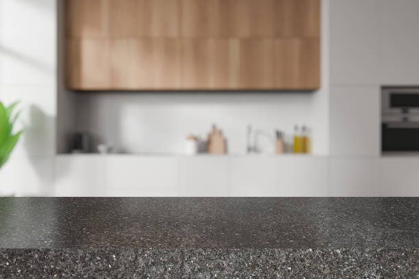 istock Grey stone counter on background of kitchen interior with kitchenware. Mockup 2037579067