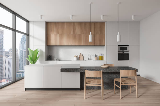 istock Stylish home kitchen interior with eating and cooking zone, panoramic window 2037593766