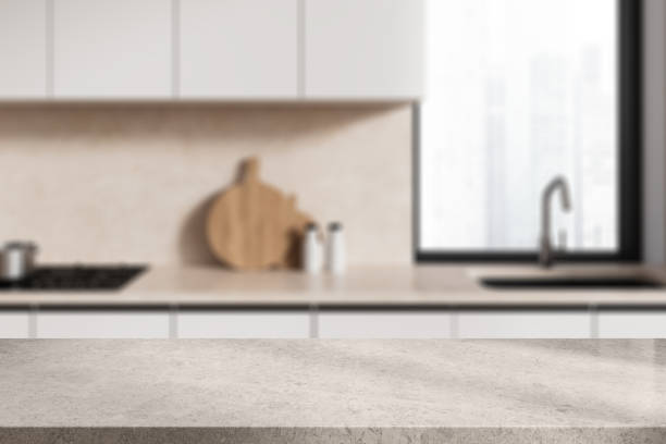 istock Product display desk in beige kitchen with window 2037594308