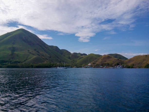 istock selective focus, natural view of an island against a clear sky. 2037604703