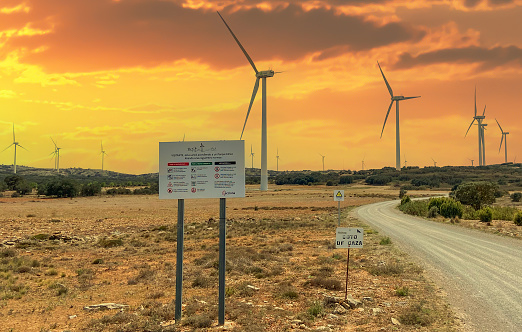 Wind turbine in mountains landscape. Eolic park ACCIONA windpower. Wind turbines alternative energy. Windmill power clean electricity generation, Windfarm. April 12, 2023, Spain, Castellon, Valencia.
