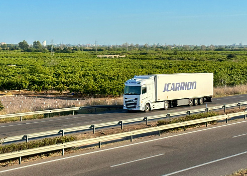 Semi truck DAF by JCARRION with Semi-trailer driving along highway. Goods Delivery by roads. Services and Transport logistics. Import - Export. April 12, 2023, Spain, Almenara.