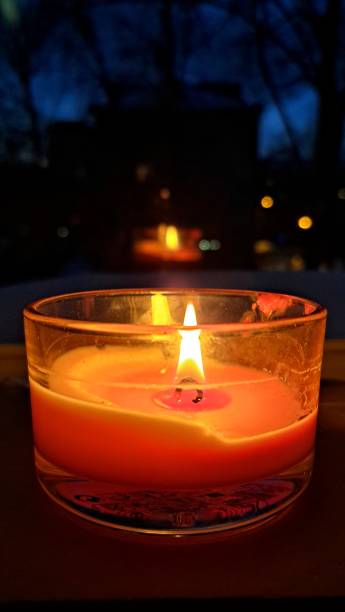 istock Candle near the night window 2037641651