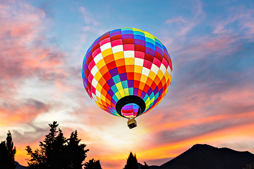 travel on hot air balloon, beautiful inspirational landscape with sunrise colorful sky