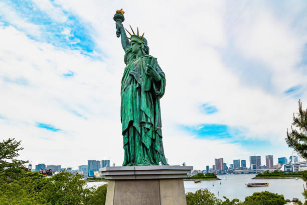 The Statue of Liberty in Tokyo is symbol of Japan's bright future. Odaiba is large artificial island in Tokyo Bay. Japan. The island is connected by the Rainbow Bridge to the center of Tokyo.