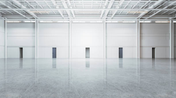 istock Empty warehouse interior with doors in row, indutrial loft with concrete floor 2037686712