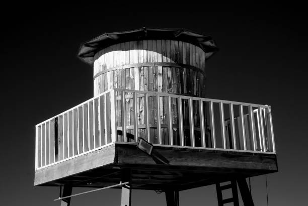 Black and white old wooden water tank