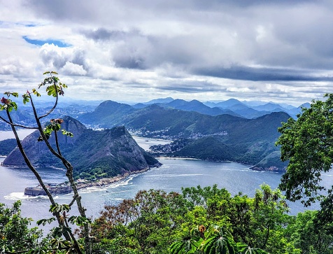 Sugarloaf Mountain (Portuguese: Pão de Açúcar) is a peak situated in Rio de Janeiro, Brazil, at the mouth of Guanabara Bay on a peninsula that juts out into the Atlantic Ocean.