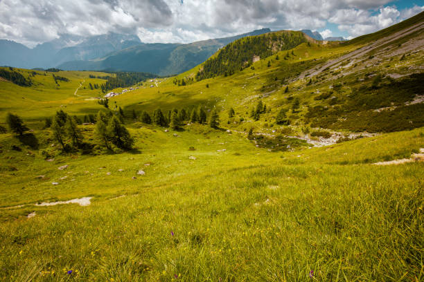 istock landscape with mountains, hills, clouds, meadow and trees 2037790029