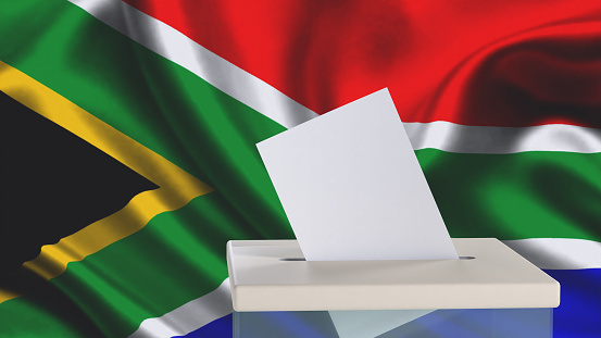 Blank ballot with space for text or logo is dropped into the ballot box against the background of the flag of South African Republic. Election concept. 3D rendering. Mock up