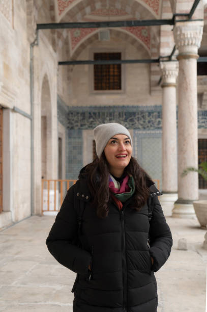 istock Young woman exploring Mosque In Istanbul 2037839137