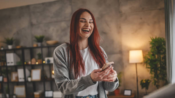 istock young woman at home use mobile phone sms texting or browse internet 2037846248