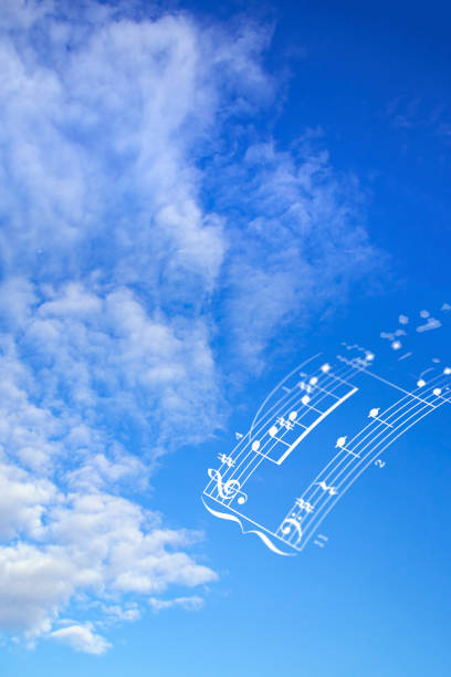 istock white cloud floating in the sky. with musical score. 2037847341
