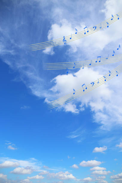 istock white cloud floating in the sky. with musical score. 2037847342