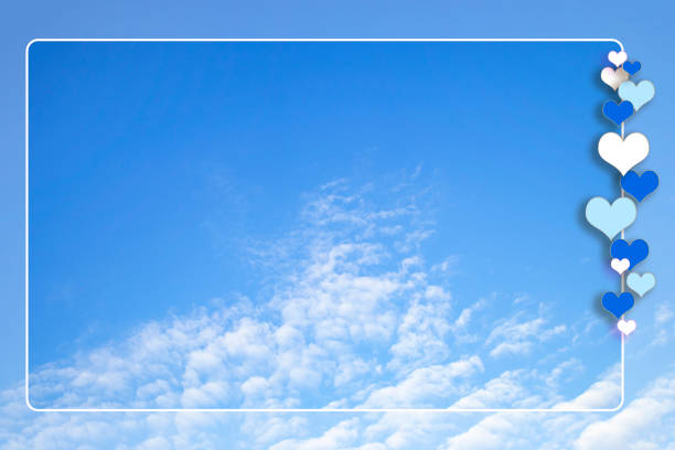 white cloud floating in the sky. heart frame.