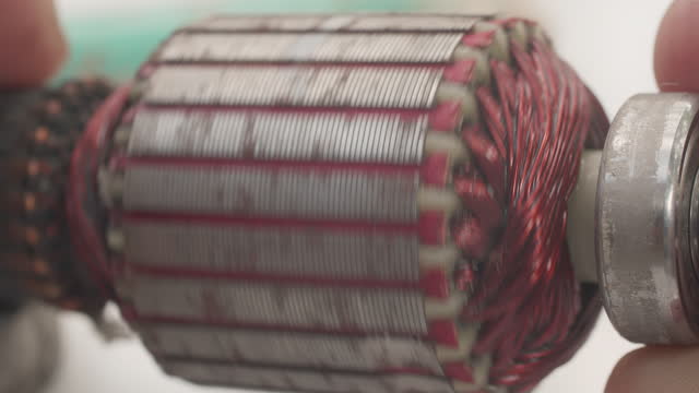 Closeup shot of copper windings in electric motors being repaired