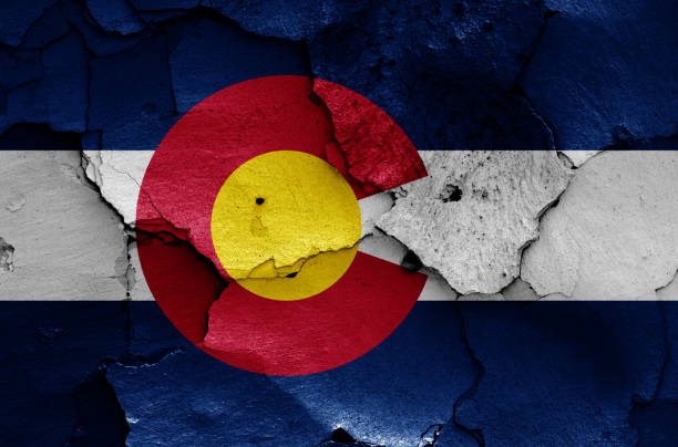 istock flag of Colorado painted on cracked wall 2037882262