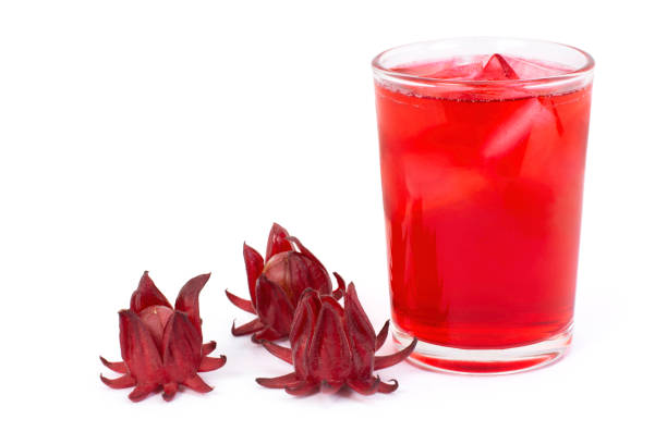istock Roselle fruit (Jamaica sorrel, Rozelle or hibiscus sabdariffa) and glass cup of roselle juice 2037893365