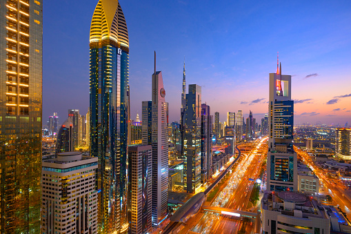 Sunset Sky and Illuminated Buildings at Twilight