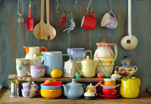 Kitchen and cooking still life with vintage kitchen utensils and crockery Kitchen and cooking still life with vintage kitchen utensils and crockery retro 1950s kitchen stock pictures, royalty-free photos & images