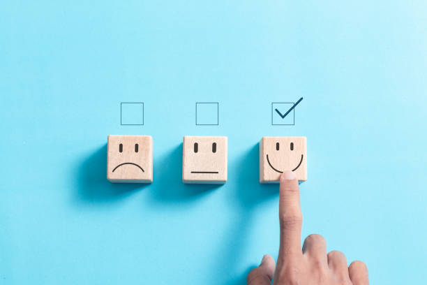 istock Hand touch wooden block with smiling face for for customer evaluation and best excellent after use product and service concept. 2037924968
