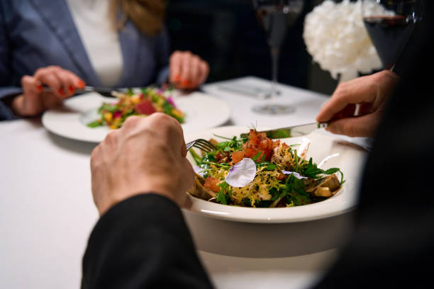 istock People have dinner in a cozy restaurant 2037927196