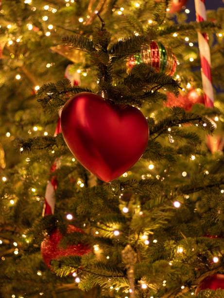 istock Christmas-tree heart-shaped toy. 2037960732