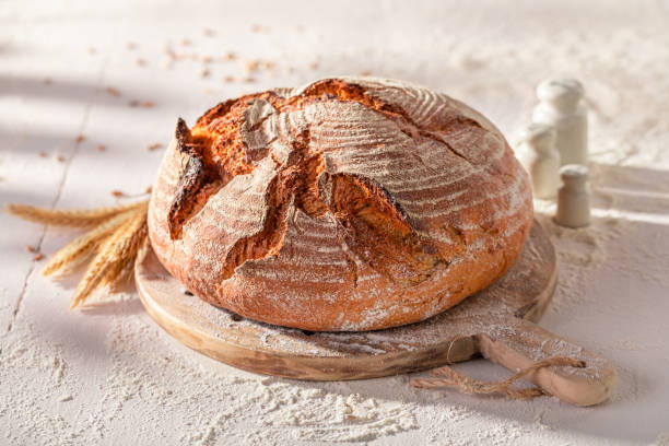 istock Tasty round loaf bread in a home bakery. 2037962366