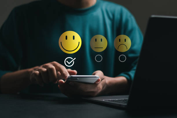 istock Customer satisfaction service concept. Businessman rate satisfaction by smiling face on application online. satisfaction feedback review, good quality most. 2037983963