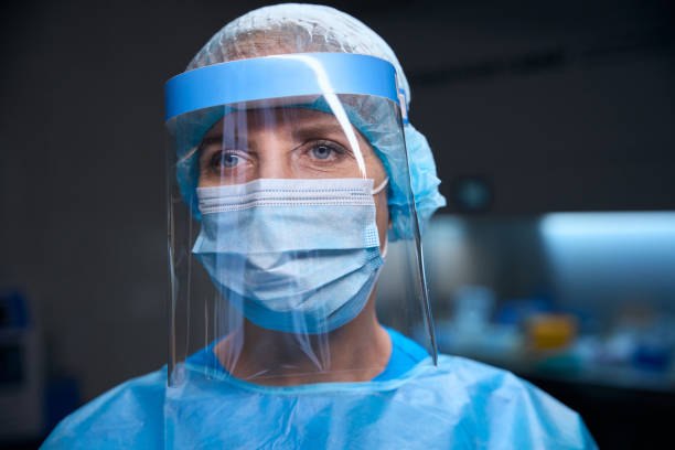 istock Woman in a modern laboratory in protective equipment 2037985684