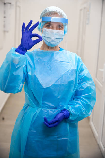 istock Female virologist in a modern laboratory in protective equipment 2037985698
